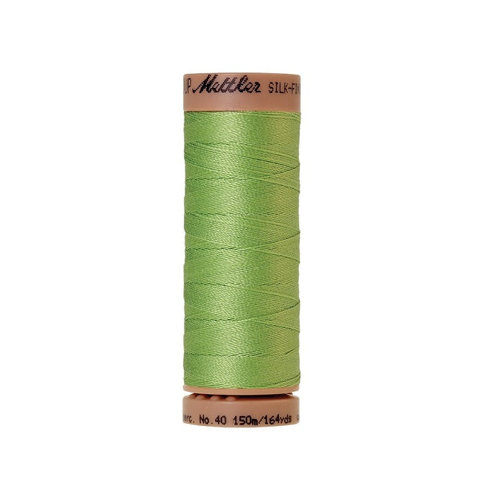 Light green thread with Mettler Cotton 40 branding.