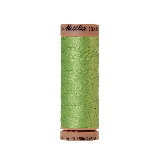 Light green thread with Mettler Cotton 40 branding.