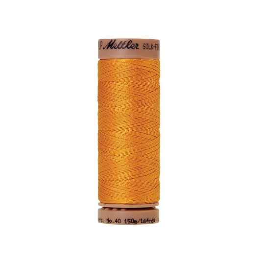 Dark yellow thread with Mettler Cotton 40 branding.