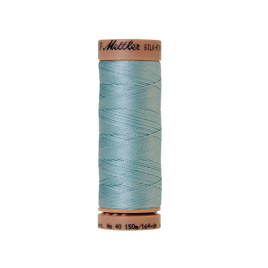 Light blue thread with Mettler Cotton 40 branding.