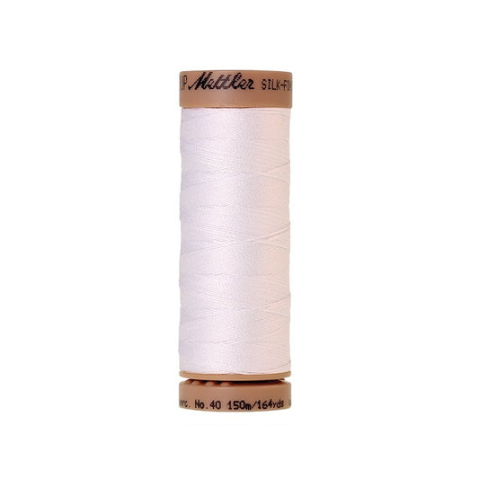White thread with Mettler Cotton 40 branding.