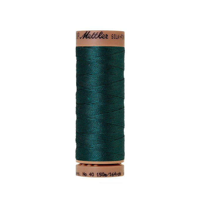 Dark green thread with Mettler Cotton 40 branding.