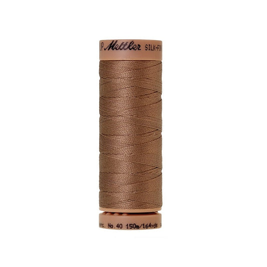 Brown thread with Mettler Cotton 40 branding.