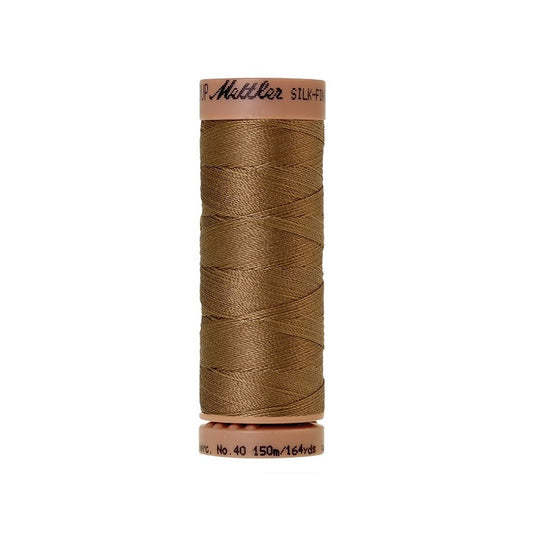 Brown thread with Mettler Cotton 40 branding.