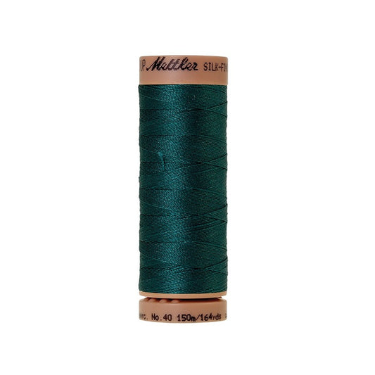 Dark green thread with Mettler Cotton 40 branding.