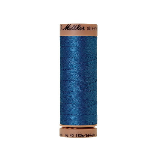 Blue thread with Mettler Cotton 40 branding.