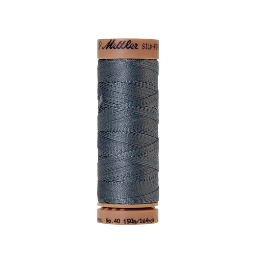 Grey thread with Mettler Cotton 40 branding.