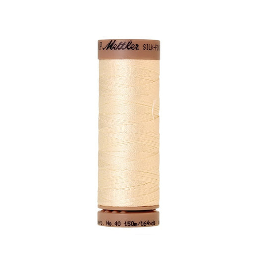 Antique white thread with Mettler Cotton 40 branding.