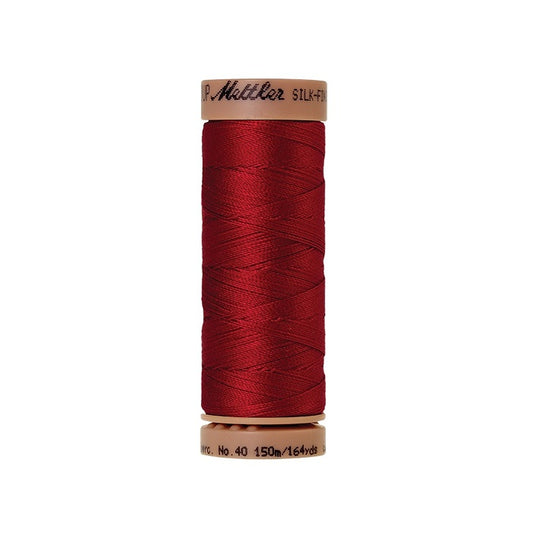 Red thread with Mettler Cotton 40 branding.
