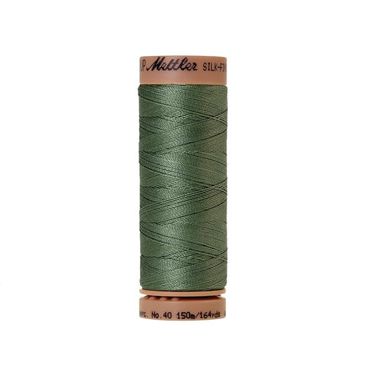 Green thread with Mettler Cotton 40 branding.