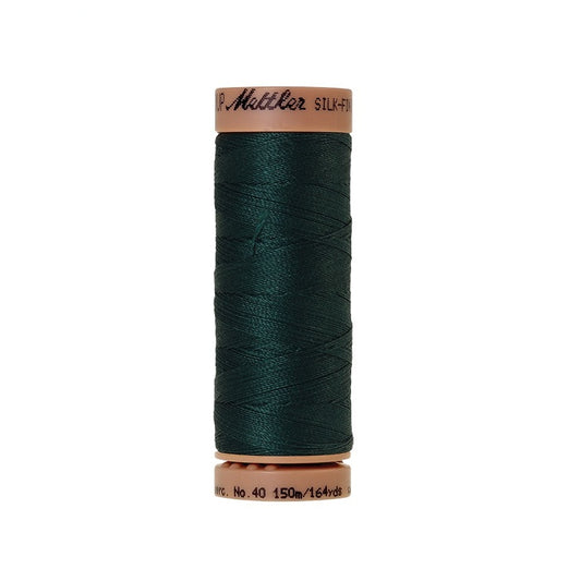 Very dark green thread with Mettler Cotton 40 branding.