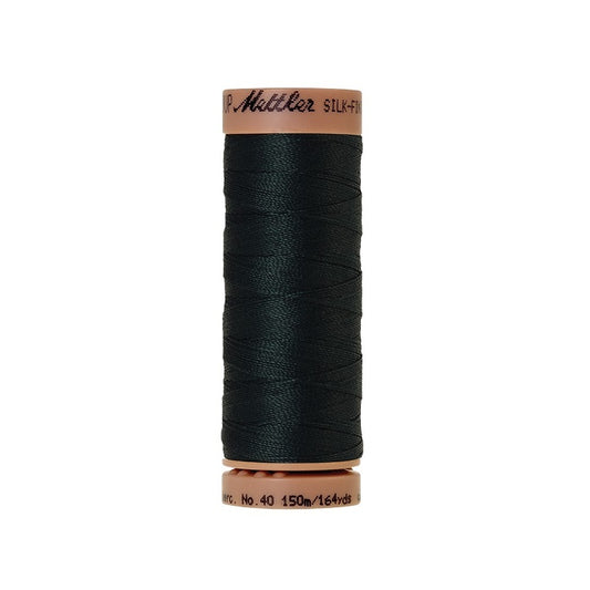 Very dark green thread with Mettler Cotton 40 branding.