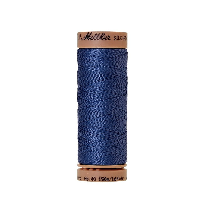 Blue thread with Mettler Cotton 40 branding.