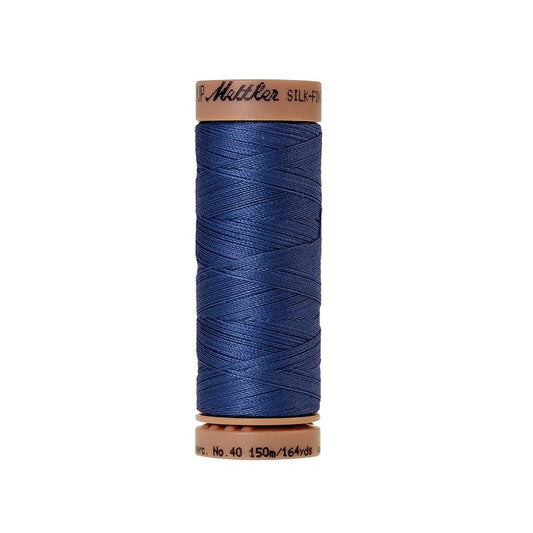 Blue thread with Mettler Cotton 40 branding.