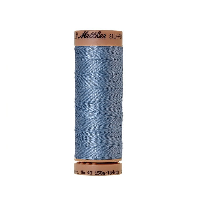 Light blue thread with Mettler Cotton 40 branding.