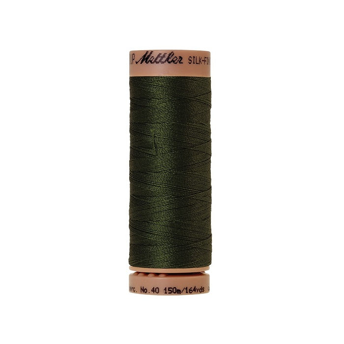 Dark green thread with Mettler Cotton 40 branding.