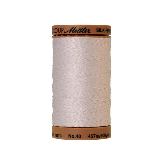 White thread with Mettler Cotton 40 branding.