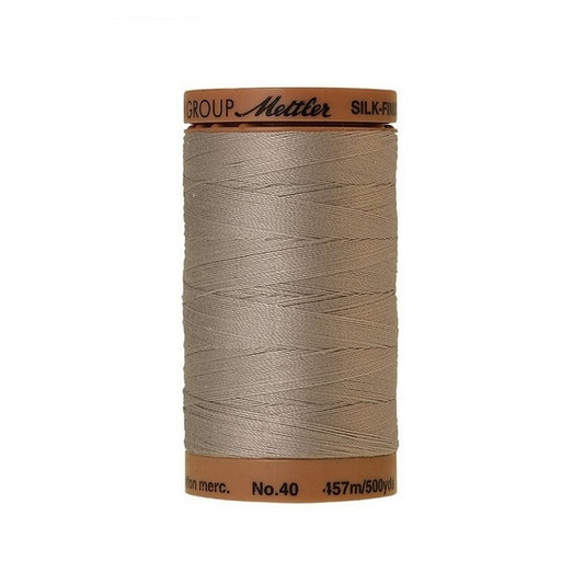 Beige thread with Mettler Cotton 40 branding.