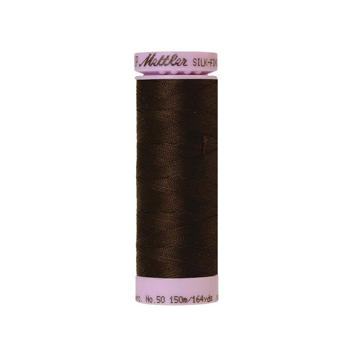 Very dark brown thread with Mettler Cotton 50 branding.