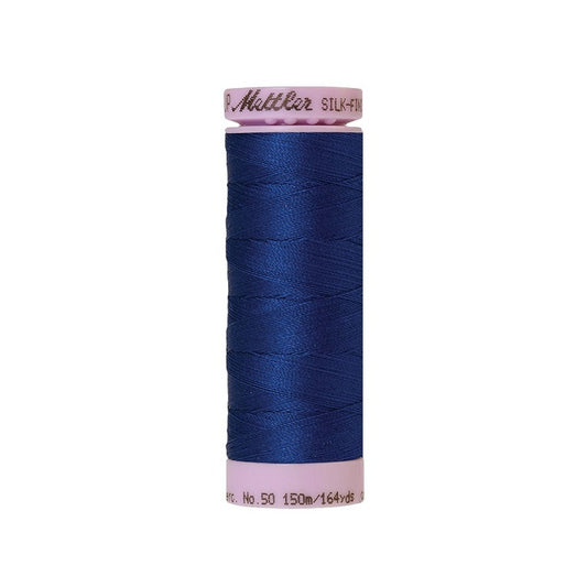Dark blue thread with Mettler Cotton 50 branding.