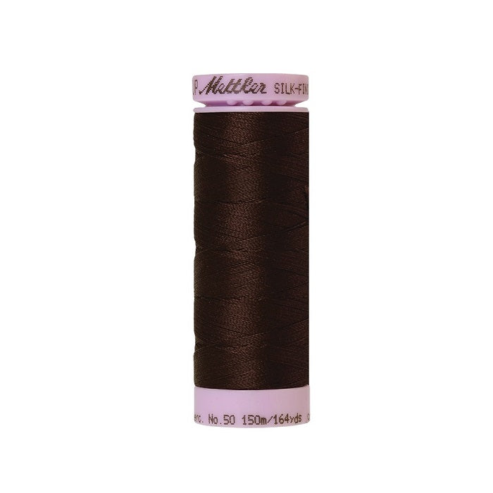 Very dark brown thread with Mettler Cotton 50 branding.