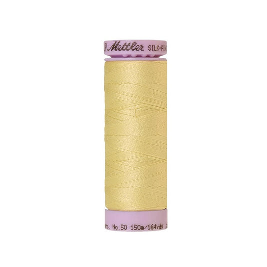 Lemon yellow thread with Mettler Cotton 50 branding.