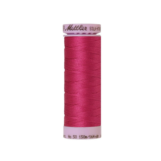 Dark pink thread with Mettler Cotton 50 branding.