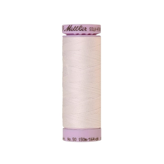 White thread with Mettler Cotton 50 branding.