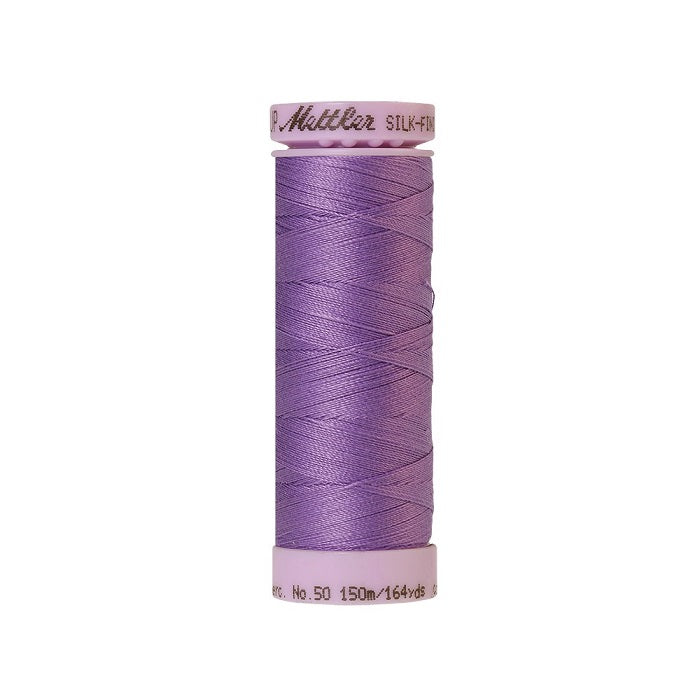 Purple thread with Mettler Cotton 50 branding.