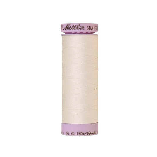 Off white thread with Mettler Cotton 50 branding.