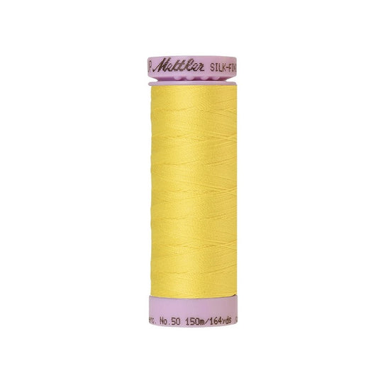 Yellow thread with Mettler Cotton 50 branding.