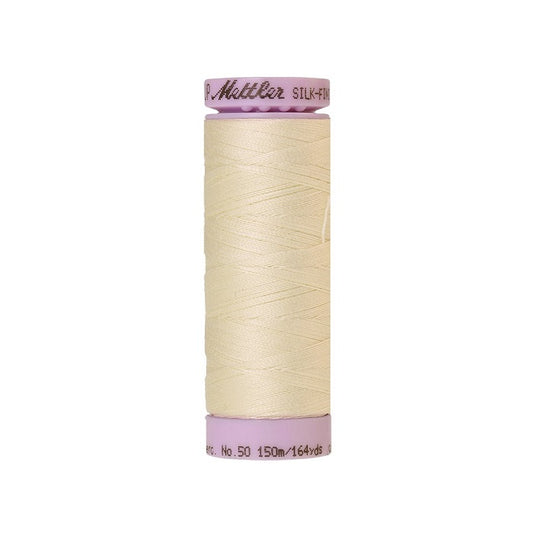 Antique white thread with Mettler Cotton 50 branding.