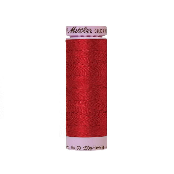 Red thread with Mettler Cotton 50 branding.