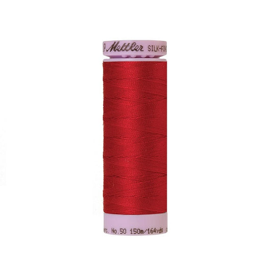 Red thread with Mettler Cotton 50 branding.