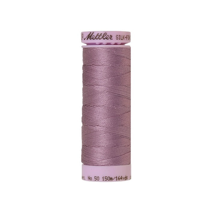 Light purple thread with Mettler Cotton 50 branding.