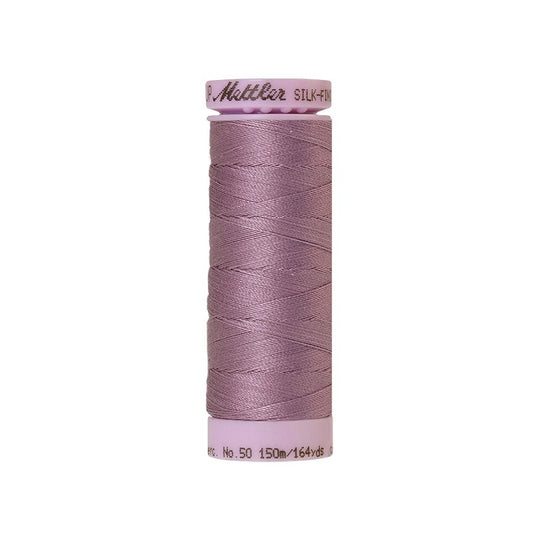 Light purple thread with Mettler Cotton 50 branding.