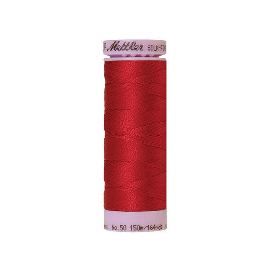 Red thread with Mettler Cotton 50 branding.