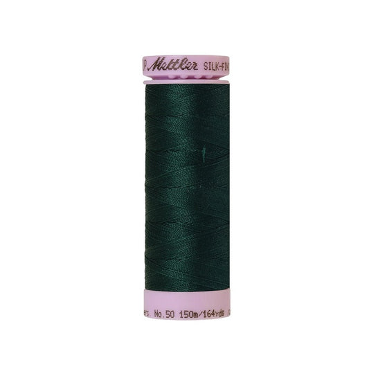 Very dark green thread with Mettler Cotton 50 branding.