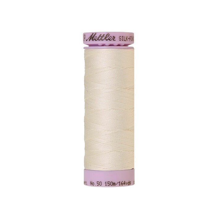 Very light beige thread with Mettler Cotton 50 branding.
