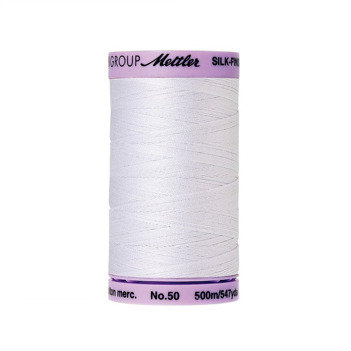 White thread with Mettler Cotton 50 branding.