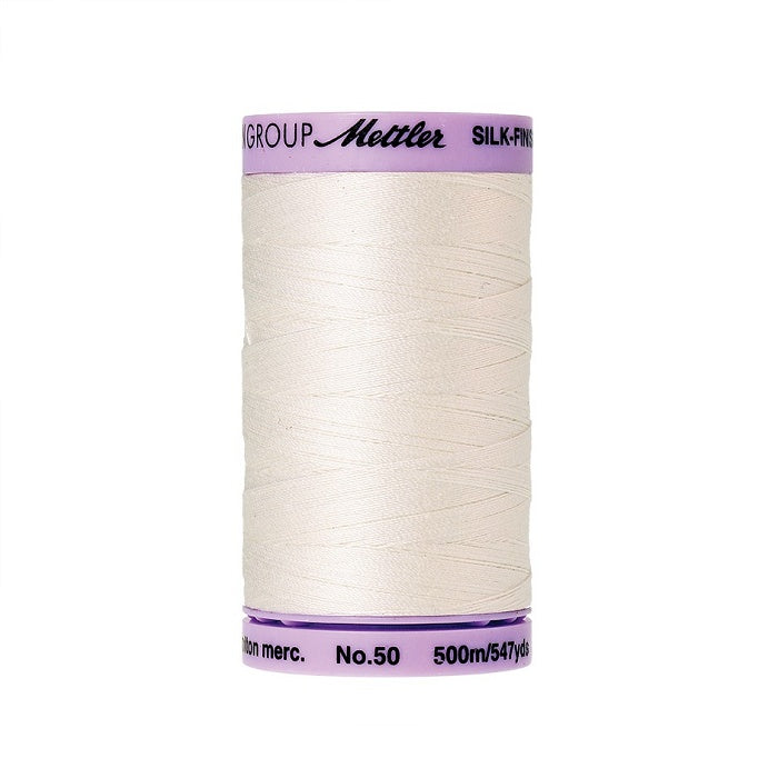 Off white thread with Mettler Cotton 50 branding.