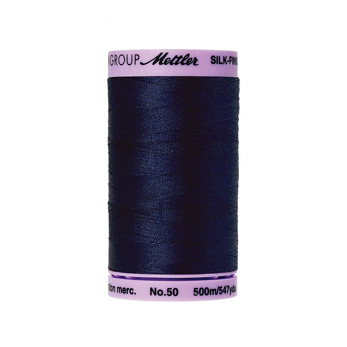 Navy thread with Mettler Cotton 50 branding.