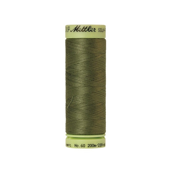 Green thread with Mettler Cotton 60 branding.