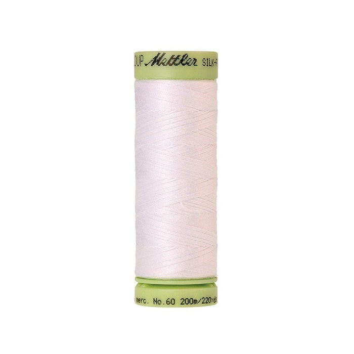 White thread with Mettler Cotton 60 branding.