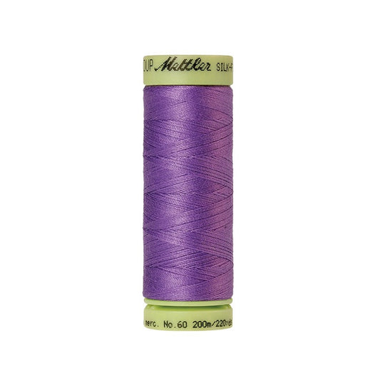 Purple thread with Mettler Cotton 60 branding.
