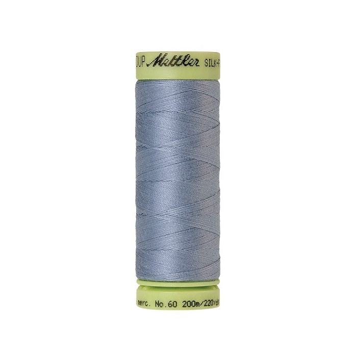 Light blue thread with Mettler Cotton 60 branding.