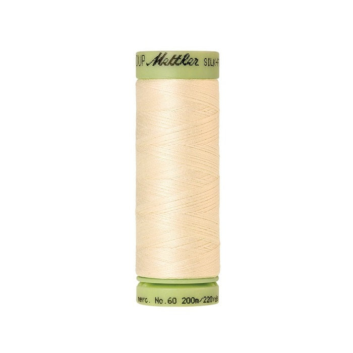 Antique white thread with Mettler Cotton 60 branding.