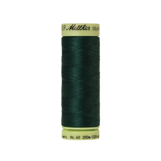 Dark green thread with Mettler Cotton 60 branding.