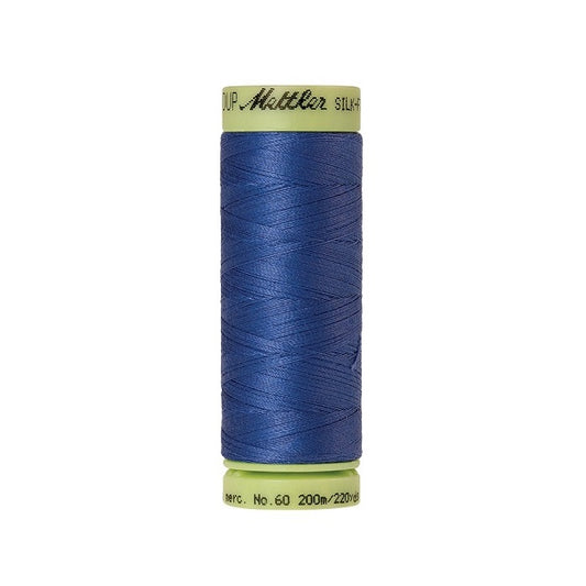 Blue thread with Mettler Cotton 60 branding.