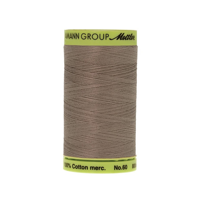 Light brown thread with Mettler Cotton 60 branding.